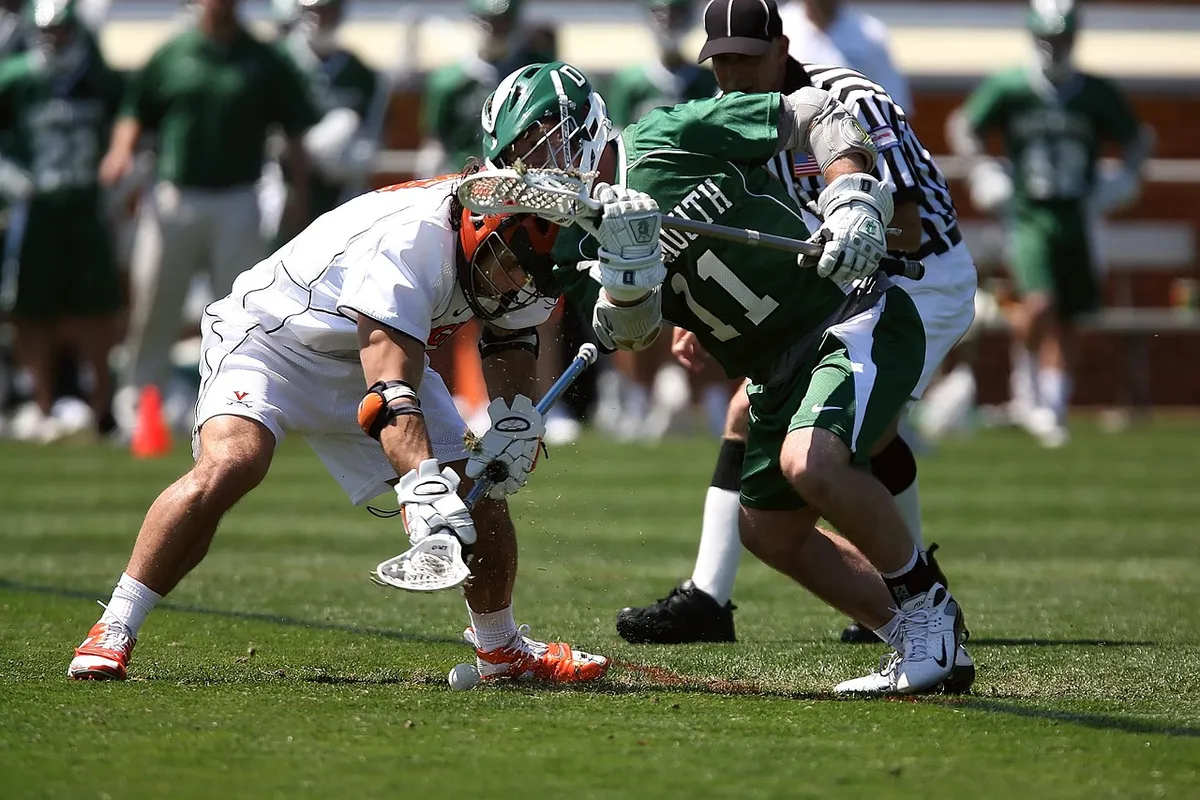 lacrosse, challenge, compete, competition, action, athletic, helmet, sport, stick, aggressive, athlete, ball, determination, college, ncaa, playing, team, male,