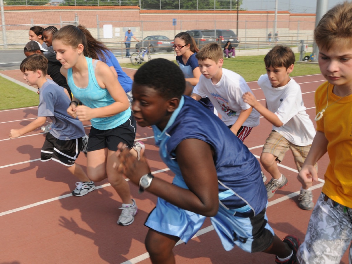 Players sprinting with ball during training
